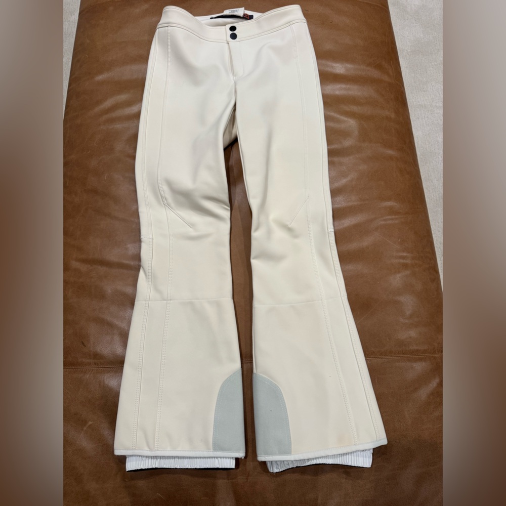 Women’s elegant ski pants size color off white. Perfect conditions.